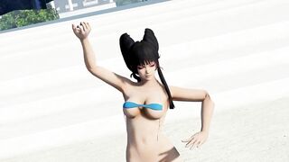 Sexy hot beauty dancing in a small bikini on the beach